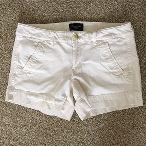 Cream khaki AE midi shorts